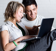 young couple with laptop